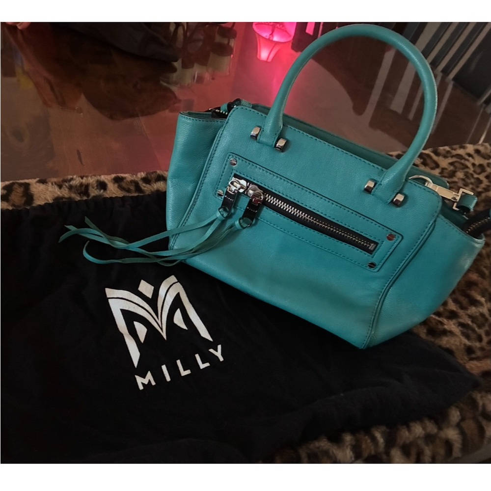 Milly Turquoise Satchel with Zipper Accent
9” bottom 
12”across 
7” ht